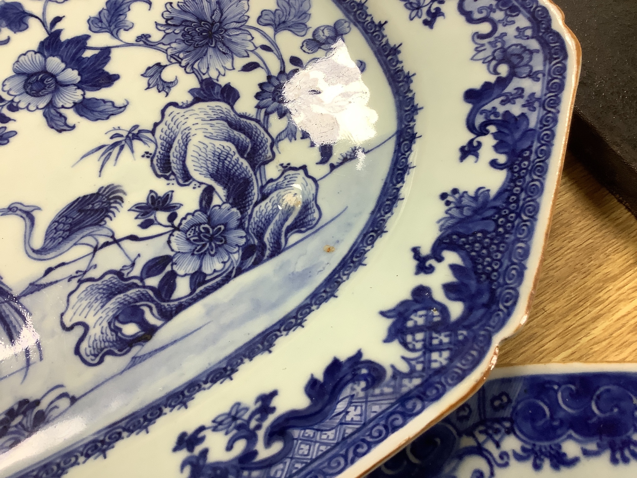 Two 18th century Chinese export blue and white meat dishes, largest 43cm